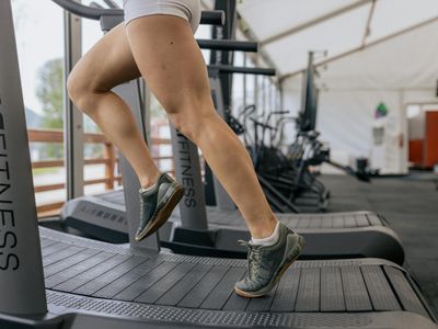 Abstract motion of running feet on treadmill