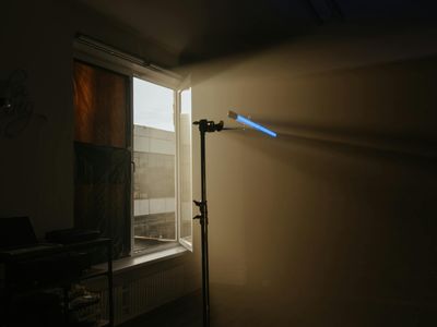 Modern minimalist studio interior with neon lights