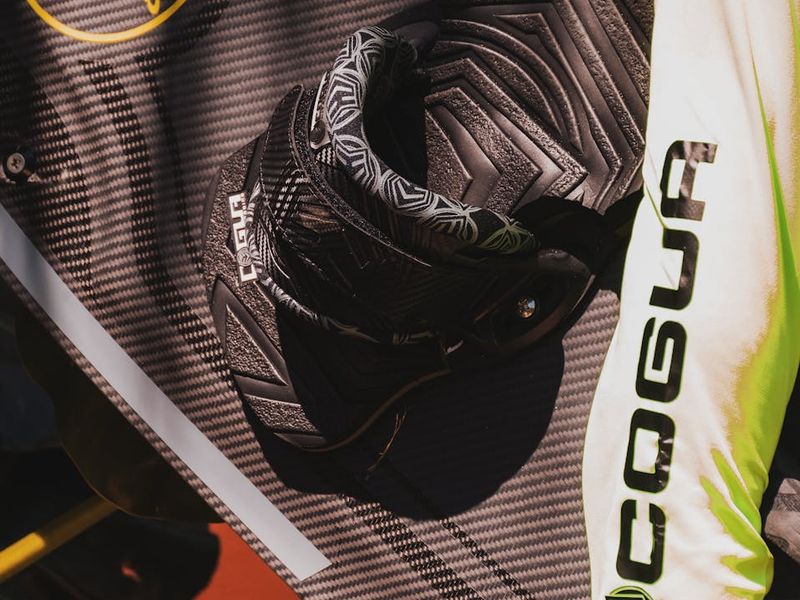 Professional sports equipment on a carbon texture background